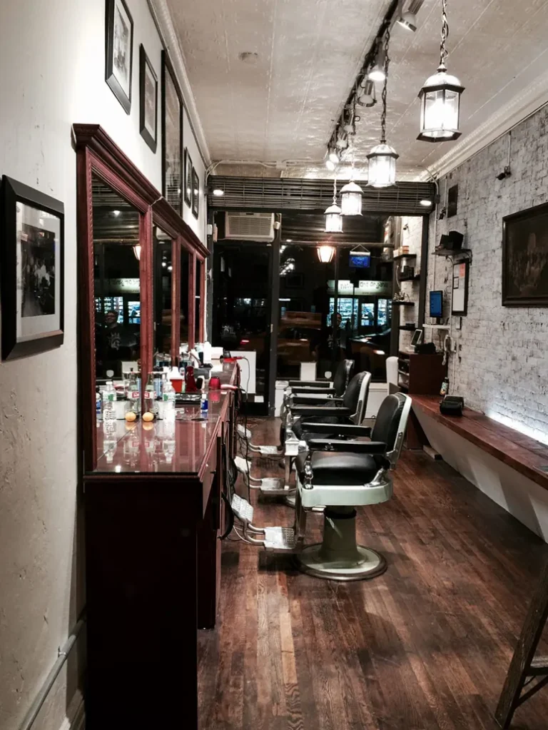 Row of classic barber chairs inside the Brooklyn shop