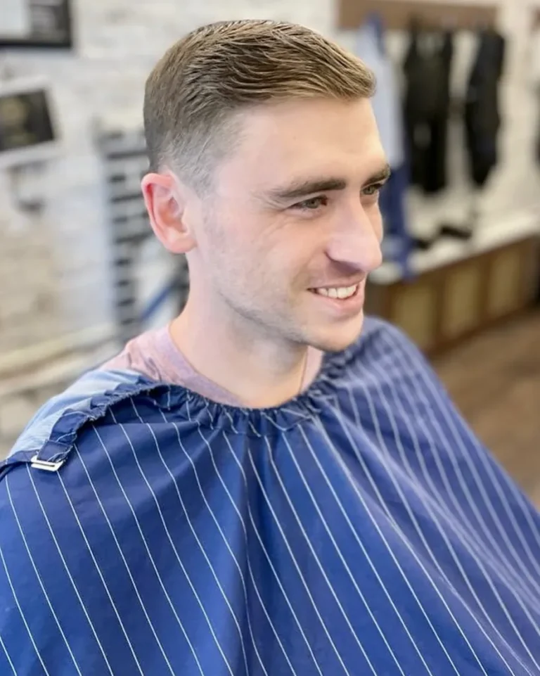 Short tapered cut with a side part