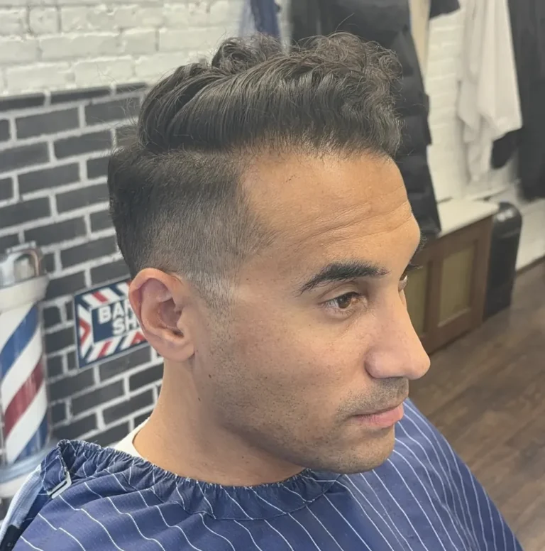 Textured quiff with a mid fade